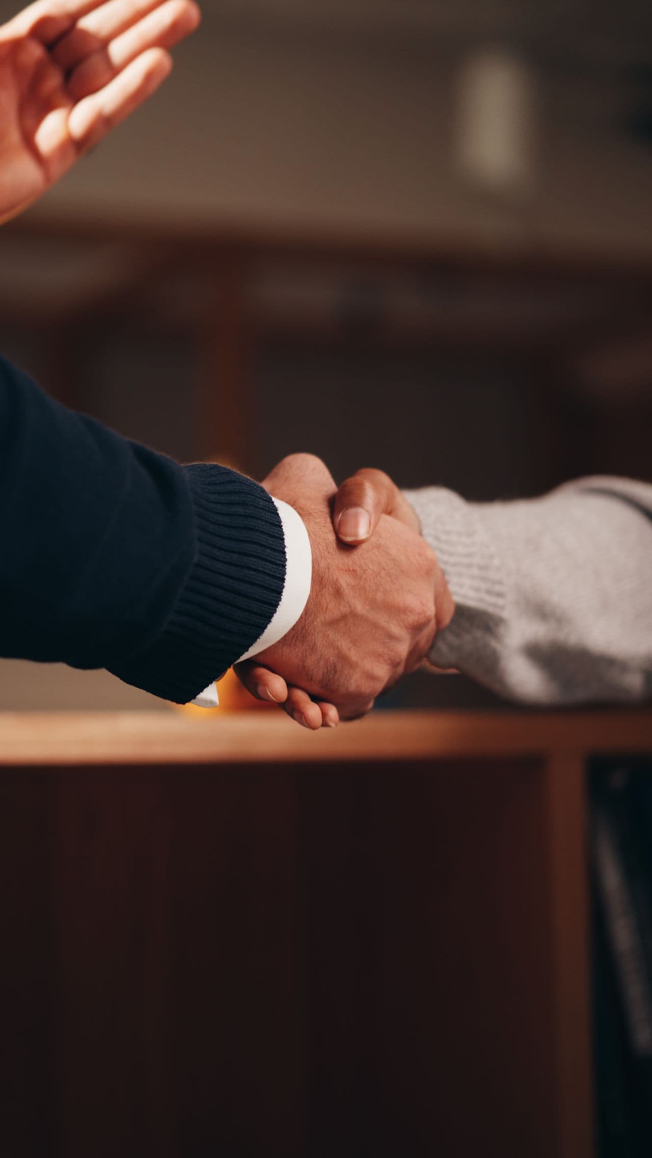 Two people shaking hands